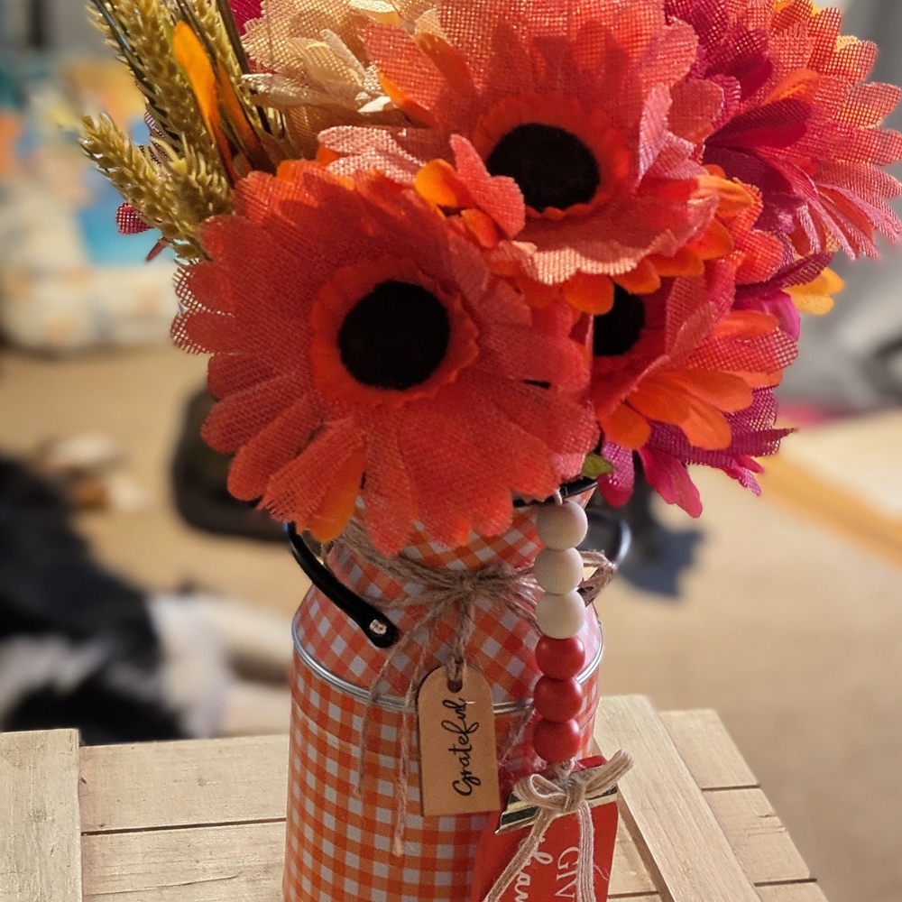 Orange and Red Floral Arrangement in Gingham Vase